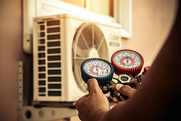 Professional Heat Pump Repair technician working in Clinton, MA